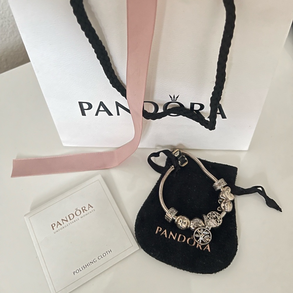 Authentic Pandora bracelet wite charms